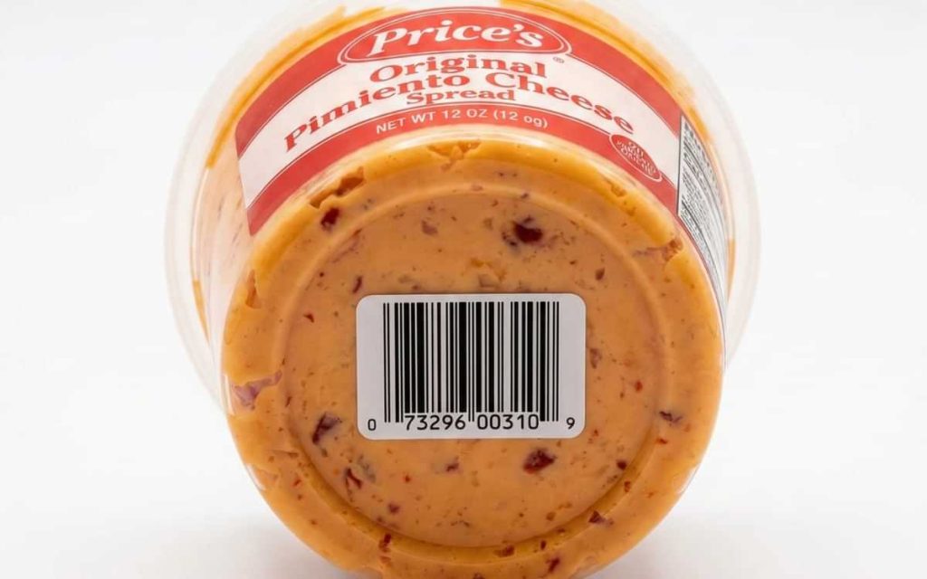Bottom view of Price's Original Pimiento Cheese Spread 12oz container displaying UPC barcode 073296003109